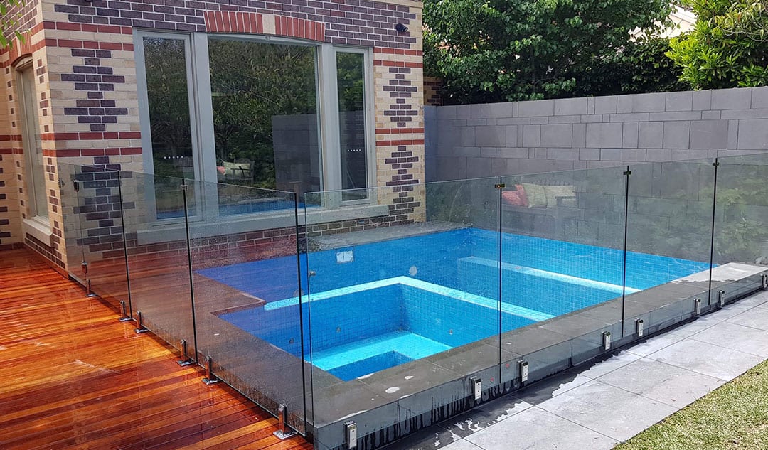 Design Trends: Stylish Pool Landscaping Ideas with Glass Fencing